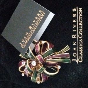 Joan Rivers purple and green enamel gold toned brooch.